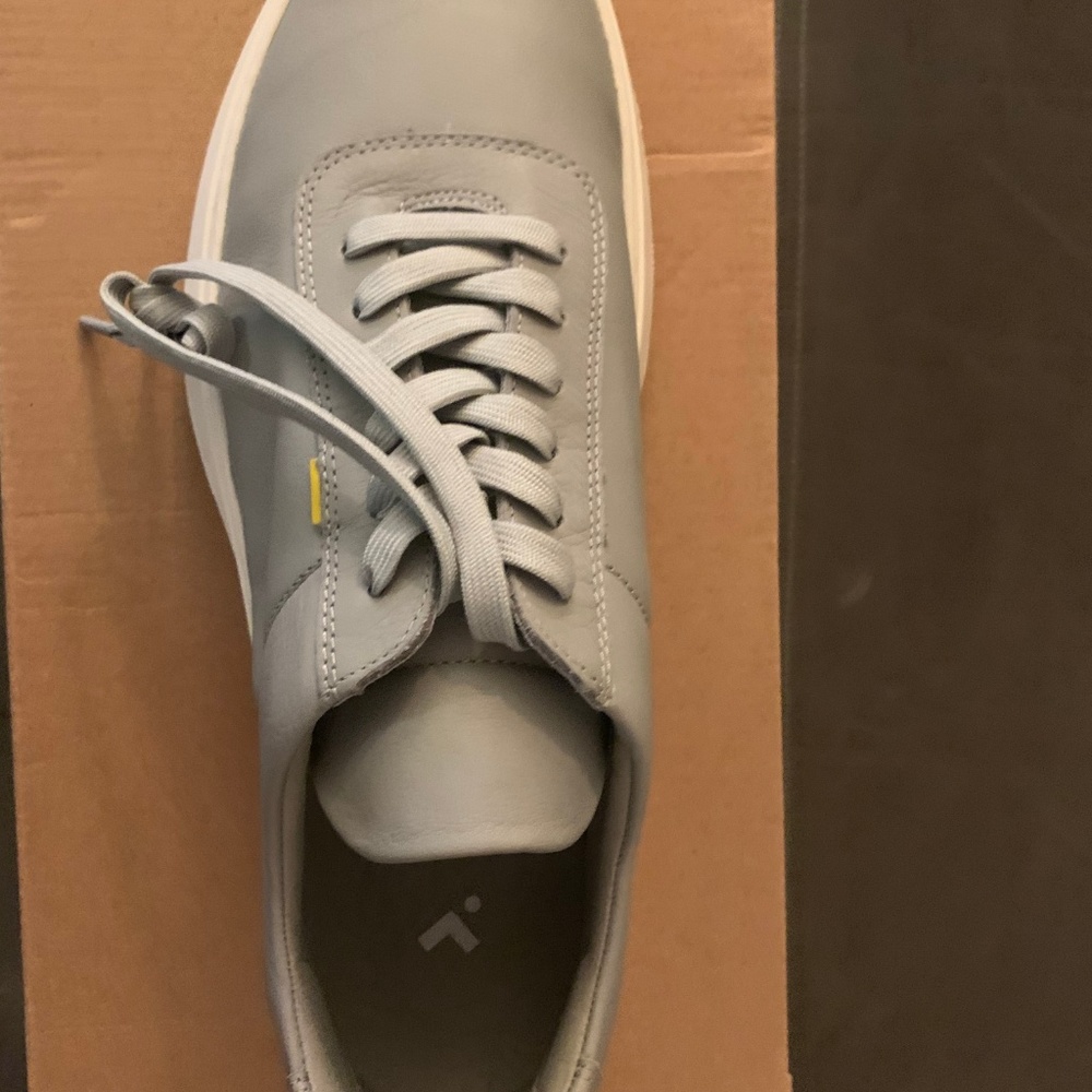 Brand New Unworn Casca Grey Leather Sneakers.